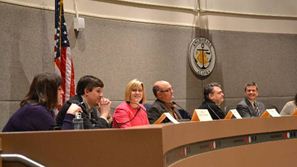 Harriet and other legislators listening