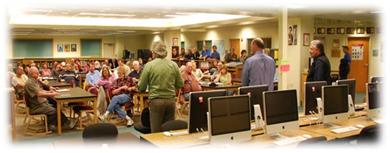 Rep Guttenberg, Senator Joe Thomas and Rep Bob Miller address a crowd at a constituent meeting