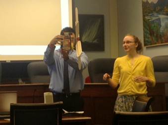 STEM students and their design project at a presentation on the importance of the program.