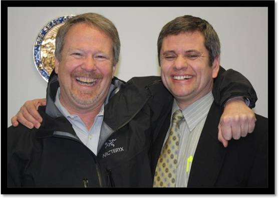 Former Representative Ralph Samuels pays a surprise visit to Representative Chris Tuck.