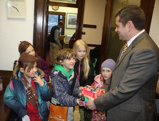 Brownie Troop 4036 recently demonstrated excellent salesmanship skills to Rep. Chris Tuck.