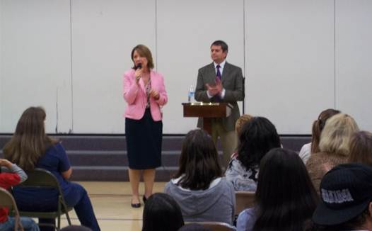 Rep. Chris Tuck and Principal Michelle Johansen address the audience at the recent Campbell Elementary School Open House.